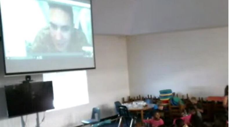 Sgt. Keith Hall, a former Spring Hill Elementary student who is stationed in Afghanistan, talks to students via Skype about his life as a solider, and his deployment abroad.