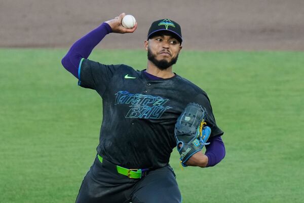 Tampa Bay Rays' Taj Bradley pitches to the Atlanta Braves during the second inning of a baseball game Friday, April 11, 2025, in Tampa, Fla. (AP Photo/Chris O'Meara)