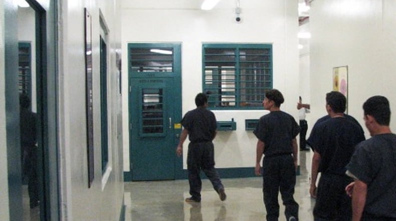 Three men who have been held in this South Georgia immigration detention center filed a federal class-action lawsuit this week against the private company that operates the facility, alleging the company is forcing detainees to cook and clean there for as little as $1 a day as part of a profit-making scheme.