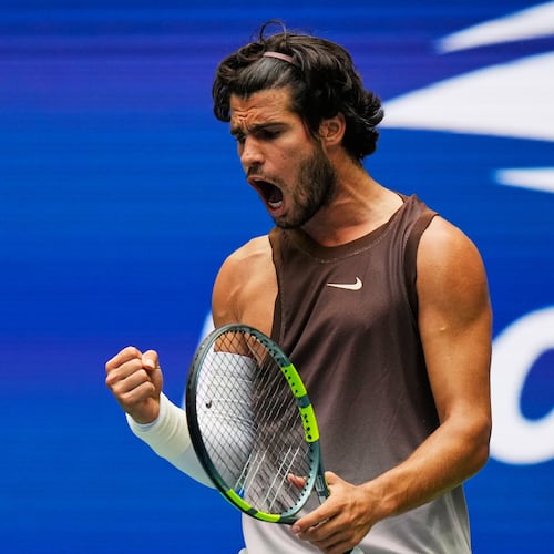 Carlos Alcaraz, of Spain, reacts during a match against Roman Safiullin, of Russia, during the first round of the U.S. Open tennis championships, Monday, Aug. 31, 2026, in New York. (AP Photo/Seth Wenig)