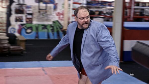 Jason Spencer in a still from WHO IS AMERICA? (season 1, episode 2) - Photo Credit: SHOWTIME