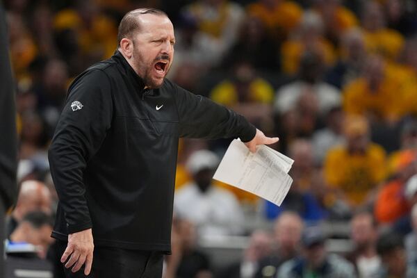 New York Knicks head coach Tom Thibodeau yells onto the court during the first half of Game 4 of the Eastern Conference finals of the NBA basketball playoffs against the Indiana Pacers in Indianapolis, Tuesday, May 27, 2025. (AP Photo/Michael Conroy)