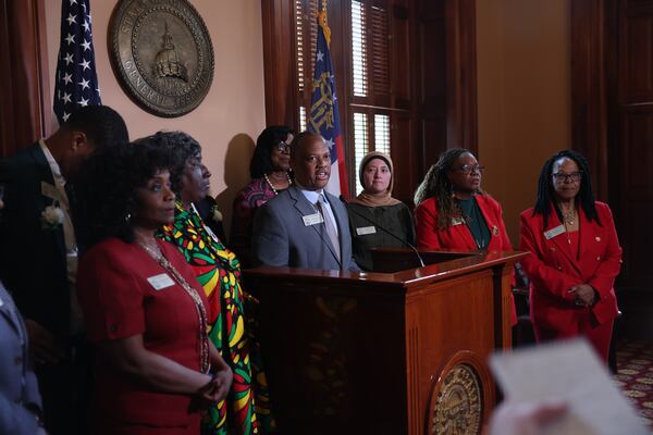 State Rep. David Wilkerson, D-Powder Springs, speaks at a news conference following a vote on property tax legislation during the special session at the Capitol in Atlanta last week. (Arvin Temkar/AJC)