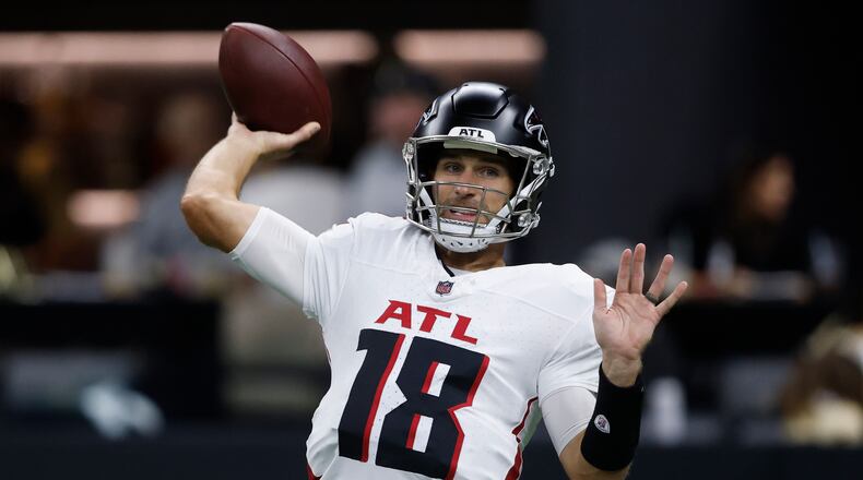 Atlanta Falcons quarterback Kirk Cousins warms up before an NFL football game against the New Orleans Saints, Sunday, Nov. 23, 2025, in New Orleans. (AP Photo/Butch Dill)