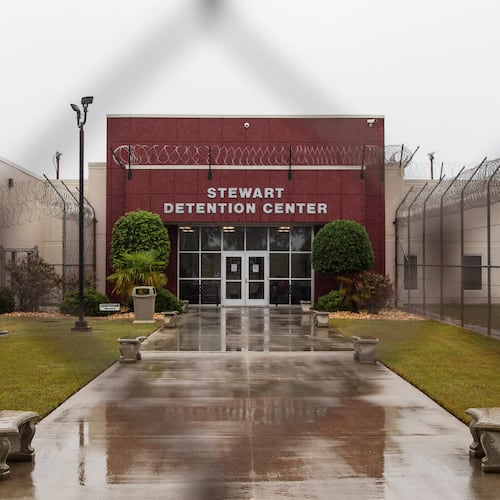 The Stewart Detention Center in Lumpkin, Ga., is seen through the front gate, on Friday, Nov. 15, 2019. Immigration and Customs Enforcement is seeking to deport an Iranian woman being held there to the Central African Republic. (David Goldman/AP 2019)