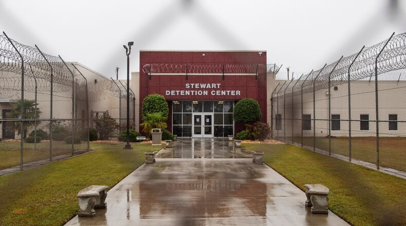 The Stewart Detention Center is seen through the front gate, Friday, Nov. 15, 2019, in Lumpkin, Ga. The rural town is about 140 miles southwest of Atlanta and next to the Georgia-Alabama state line. The town’s 1,172 residents are outnumbered by the roughly 1,650 male detainees that U.S. Immigration and Customs Enforcement said were being held in the detention center in late November. (David Goldman/AP)