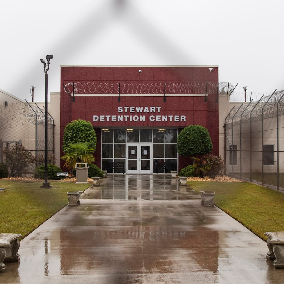 The Stewart Detention Center in Lumpkin, Ga., is seen through the front gate, on Friday, Nov. 15, 2019. Immigration and Customs Enforcement is seeking to deport an Iranian woman being held there to the Central African Republic. (David Goldman/AP 2019)
