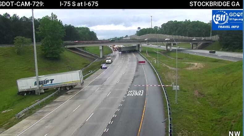 The wreck may involve as many as three tractor-trailers.