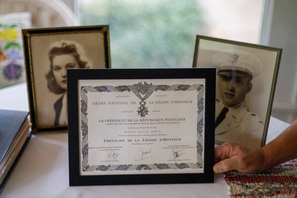 A certificate recognizing Avery Low as a Chevalier of France's Legion of Honor is displayed at his home in Savannah. (Walker Smith for the AJC)
