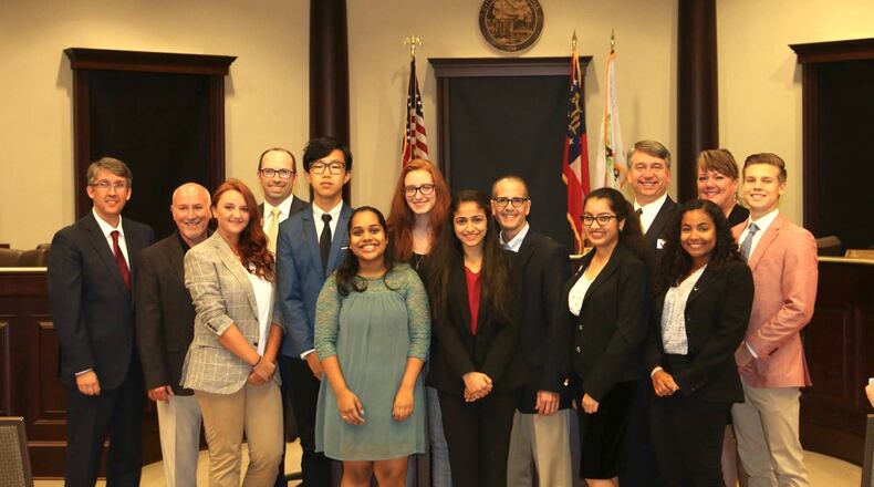 Sugar Hill 2018-2019 Youth Council members Laura Ann Acker, Camryn Flores, Nida Merchant, Bhaumi Shah, Camden Doker, Khushi Mehta, Hyunwoo (Daniel) Park, and Alexis (Lexi) Ducote were sworn in by Mayor Steve Edwards at the city council meeting Sept. 10.
