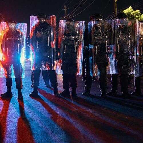 Police stand behind their shields as they prepare to clash with protesters outside the Delaney Hall detention center during a protest against the transfer of detainees and federal immigration policies on Saturday, May 30, 2026, in Newark, N.J. (AP Photo/Andres Kudacki)