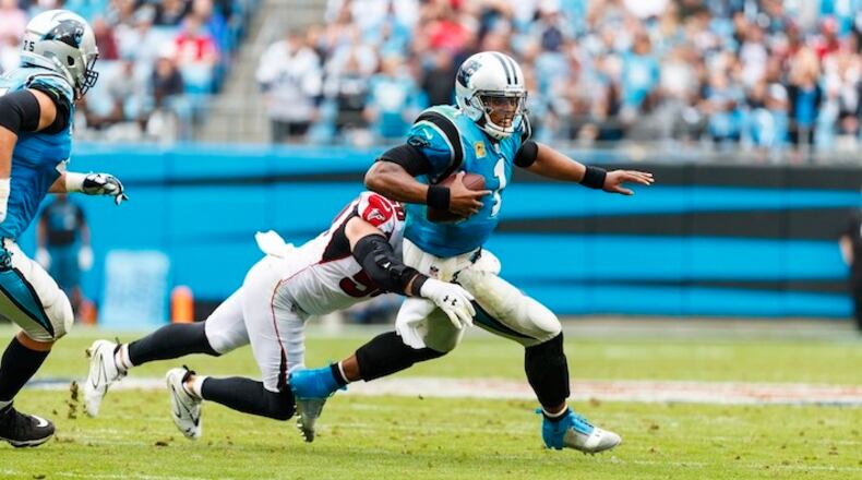 Carolina Panthers quarterback Cam Newton (1) runs with the ball against the Atlanta Falcons during an NFL game in Charlotte, N.C. on Sunday, Nov. 5, 2017. (Chris Keane/AP Images for Panini)