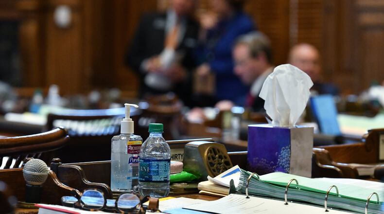March12, 2020 Atlanta - Hand sanitizer and tissue are on the table during Crossover day at the Georgia State Capitol on Thursday, March 11, 2020. (Hyosub Shin / Hyosub.Shin@ajc.com)