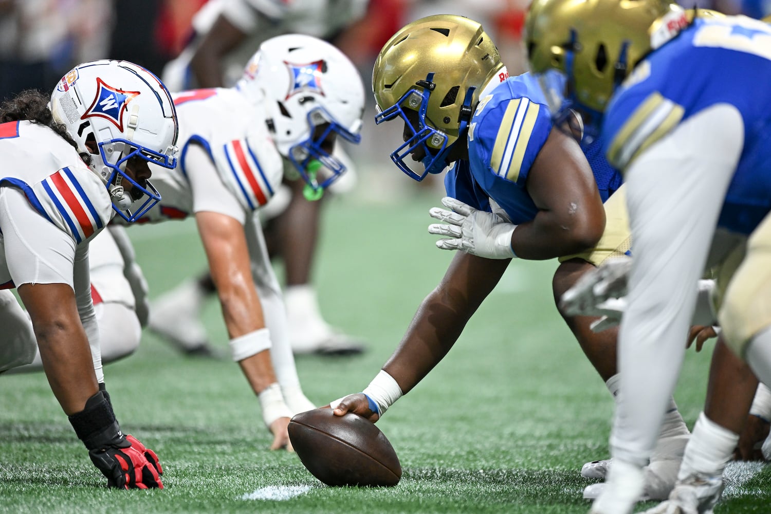 The McEachern Indians face off against the Walton Raiders during the Corky Kell Classic football game Saturday, August 16, 2025 at the Mercedes-Benz Stadium. (Daniel Varnado/For the Atlanta Journal-Constitution)