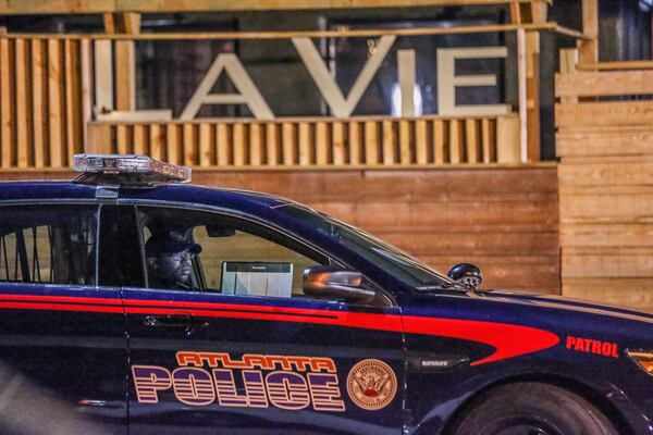 The Georgia Bureau of Investigation is investigating an officer-involved shooting Thursday at La Vie Hookah Bar Bistro on Luckie Street. JOHN SPINK / JSPINK@AJC.COM