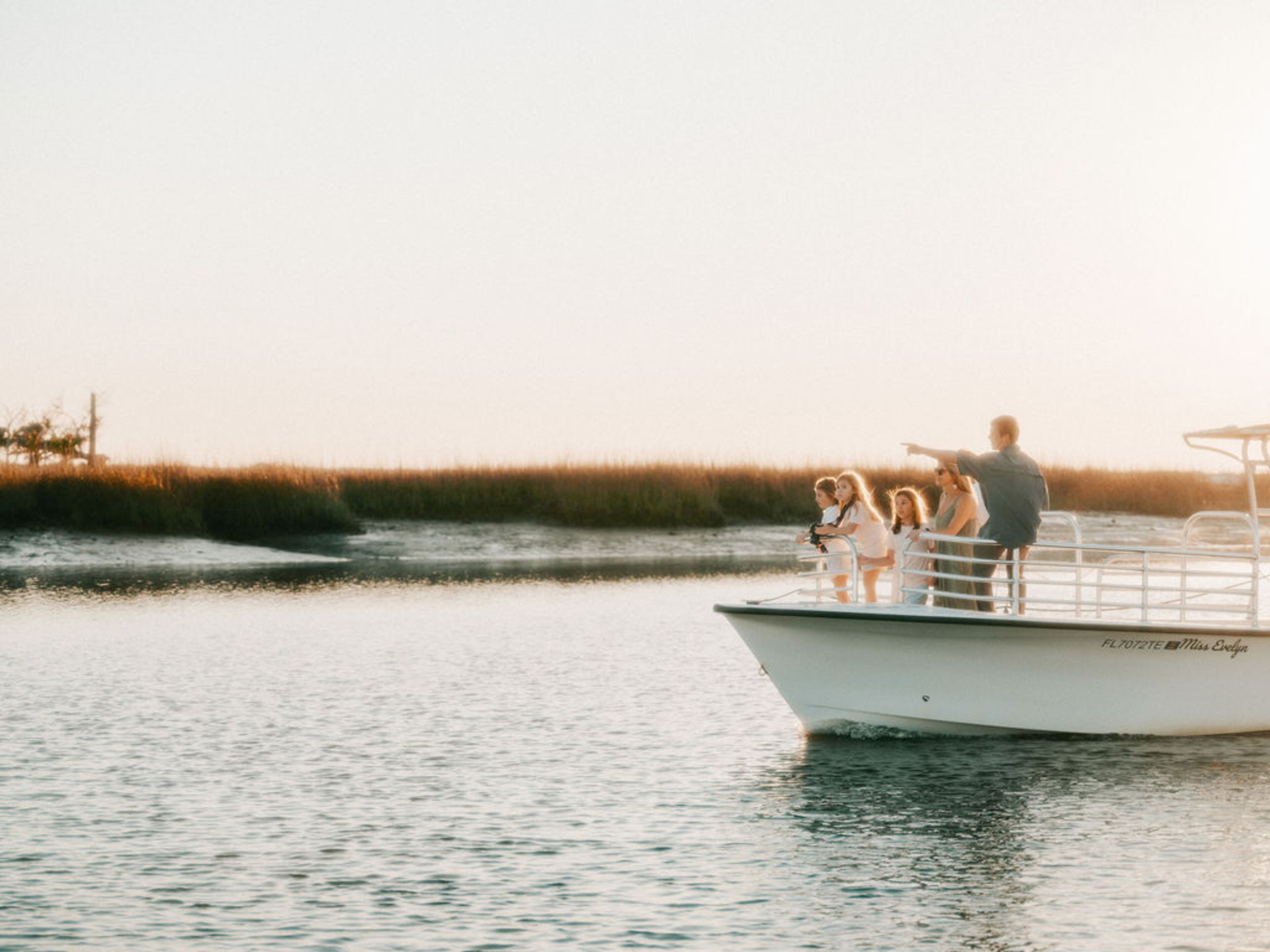 Amelia Island visitors on a dolphin tour offered by Ritz-Carlton, Amelia Island. Provided by the Ritz-Carlton.
