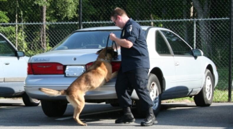 Peachtree City residents are raising funds to replace former K-9 officer Maik, seen here with his handler, Officer Andy Johnson. Courtesy Peachtree City