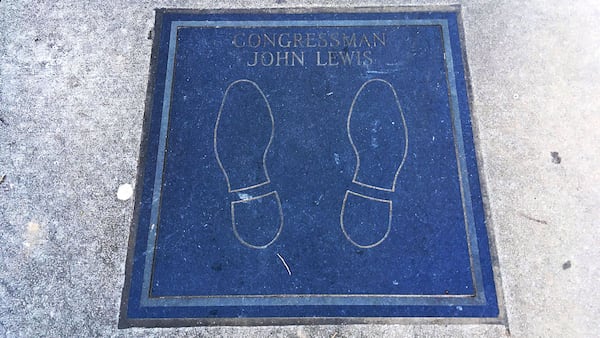 John Lewis's literal footprints are included in the display at the National Park Service's Martin Luther King Jr. National Historic Site. The honor was created by Xernona Clayton in 2004 and includes such notable leaders as Maya Angelou, Hank Aaron and Bill Clinton. (Pete Corson / pcorson@ajc.com)