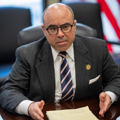 U.S. Attorney Andrew Boutros gestures at the Dirksen U.S. Courthouse, Friday, April 3, 2026, in Chicago. (E. Jason Wambsgans/Chicago Tribune via AP)