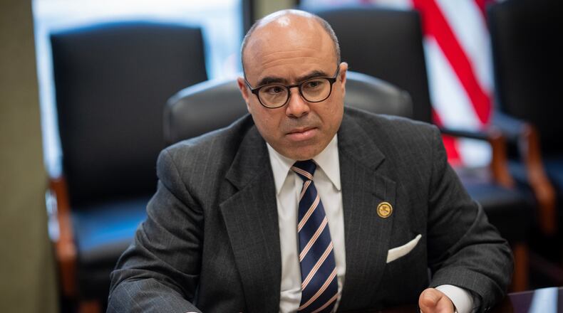 U.S. Attorney Andrew Boutros gestures at the Dirksen U.S. Courthouse, Friday, April 3, 2026, in Chicago. (E. Jason Wambsgans/Chicago Tribune via AP)