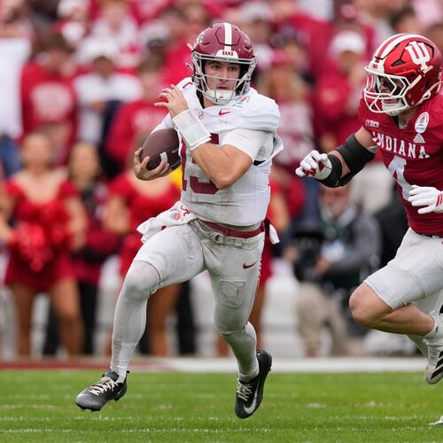 Alabama quarterback Ty Simpson (15) is chased by Alabama linebacker Qua Russaw (4) during the first half of the Rose Bowl College Football Playoff quarterfinal game Thursday, Jan. 1, 2026, in Pasadena, Calif. (AP Photo/Mark J. Terrill)