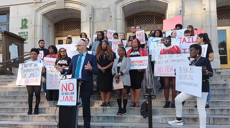 Recently formed advocacy group Communities Over Cages calls for renovating old Fulton County jail, reducing incarceration instead of building a larger new jail.