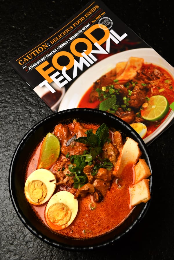 Jane Ewe, whose family owns the Sweet Hut bakeries and Food Terminal restaurants, says that the increased number of Asian restaurants in the Atlanta metro area drives her business and others to remain sharp. Shown here is Food Terminal's Curry Laksa Chicken Noodle Soup. (Chris Hunt for The Atlanta Journal-Constitution) 