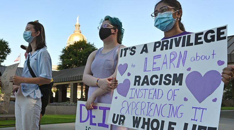 Students, former students, parents, teachers, former teachers, and advocates participate in a rally outside Georgia Department of Education on June 17, 2021. Republican lawmakers recently introduced several bills to limit how race can be discussed in schools. (Hyosub Shin / Hyosub.Shin@ajc.com)