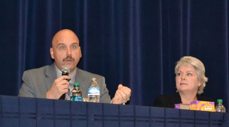 Fayette County Sheriff Barry Babb (seated next to Sandy Creek English teacher Phyllis Lightle) said his officers are receiving additional training to better serve a more diverse population. Photo by Jill Howard Church for the AJC