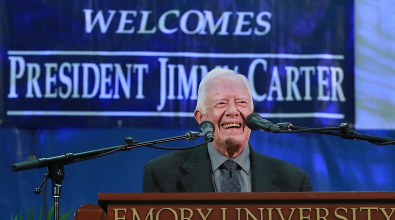 Former President Jimmy Carter takes the podium to answer questions from students during his annual town hall with Emory University freshmen in the campus gym on Sept 12, 2018, in Atlanta. CURTIS COMPTON / CCOMPTON@AJC.COM