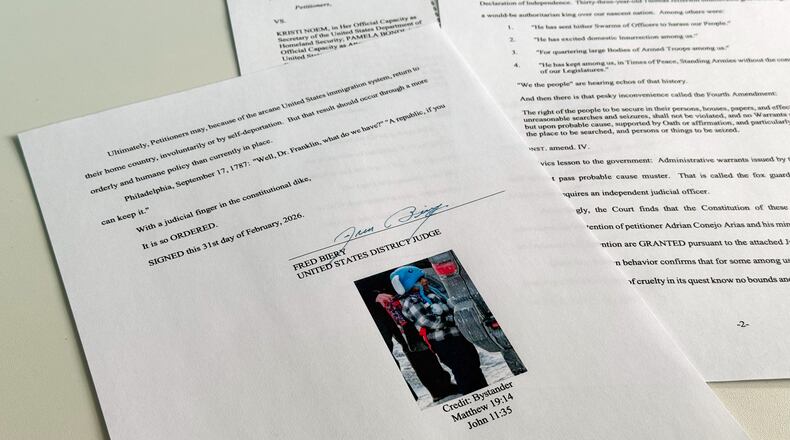 An order to release 5-year-old Liam Conejo Ramos and his father from detention, which included a picture of the boy and Bible verse references under the signature of U.S. District Judge Fred Biery, is photographed Saturday, Jan. 31, 2026. (AP Photo/Sydney Schaefer)