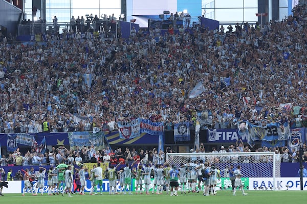 Argentina fans and players celebrate the team’s win over Egypt during the FIFA World Cup match at Atlanta Stadium on Tuesday, July 7, 2026. (Jason Getz/AJC)