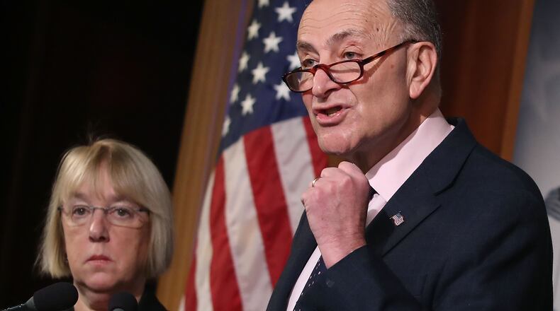 Senate Minority Leader Charles Schumer, D-N.Y., speaks Thursday while flanked by U.S. Sen. Patty Murray, D-Wash., during a news conference in Washington, D.C. Schumer called for an investigation into the business dealings of U.S. Rep. Tom Price, R-Roswell, before the Senate begins confirmation hearings on Price’s nomination to be the next secretary of health and human services. (Photo by Mark Wilson/Getty Images)