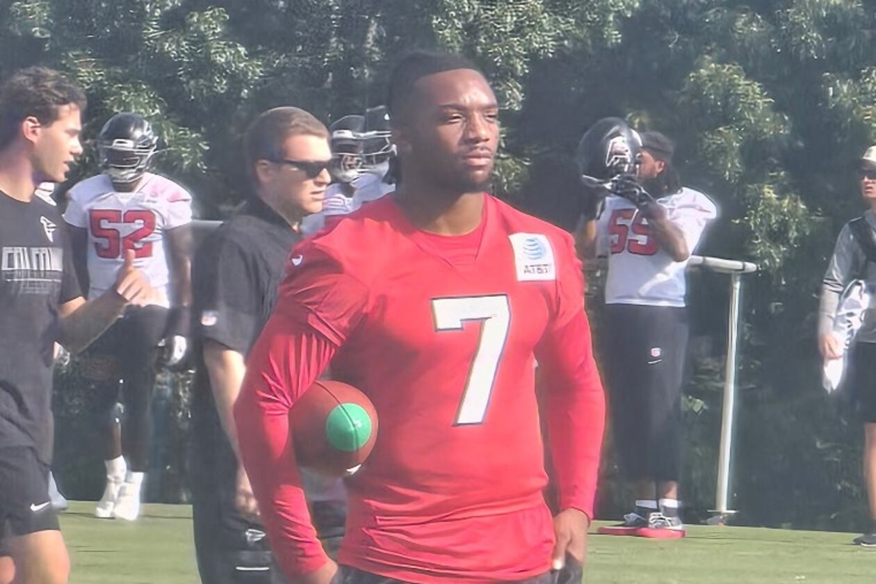 Bijan Robinson watches practices Friday, July 31, 2026 as he reportedly is looking to get a new contract. (Rod Beard/AJC)