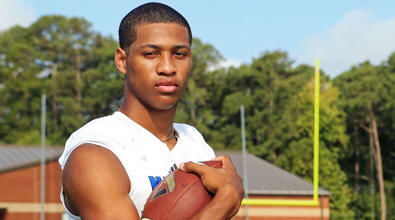 Nyland Green, a senior defensive back at Newton High School, poses for a photo on Thursday, August 6, 2020, at Homer Sharp Stadium in Covington, Georgia. Green is one of the top 11 high school senior recruits in the state of Georgia for 2020.  CHRISTINA MATACOTTA FOR THE ATLANTA JOURNAL-CONSTITUTION.