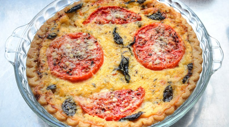 For generations, Southerners have baked tomatoes, cheese and mayo in a crust and called it tomato pie. This Southern Tomato Pie nods to Italy with the addition of basil and Parmesan. Use whatever cheese and herbs you like, and if you end up with extra cheese, it never hurts to sprinkle a little more on top. STYLING BY WENDELL BROCK / CONTRIBUTED BY CHRIS HUNT PHOTOGRAPHY