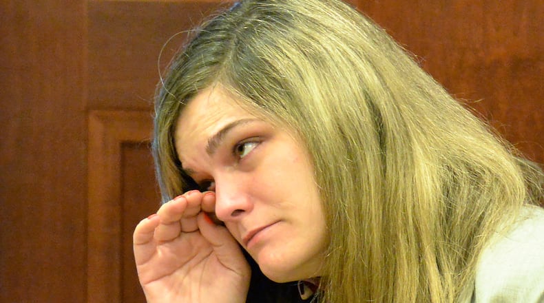 December 15, 2015 McDonough - Jennifer Rosenbaum, who is charged with child abuse and murder in connection with 2-year-old Laila Marie Daniel’s death, is close to tears before her bond hearing at Henry County Superior Court in McDonough on Tuesday December 12, 2015. HYOSUB SHIN / HSHIN@AJC.COM