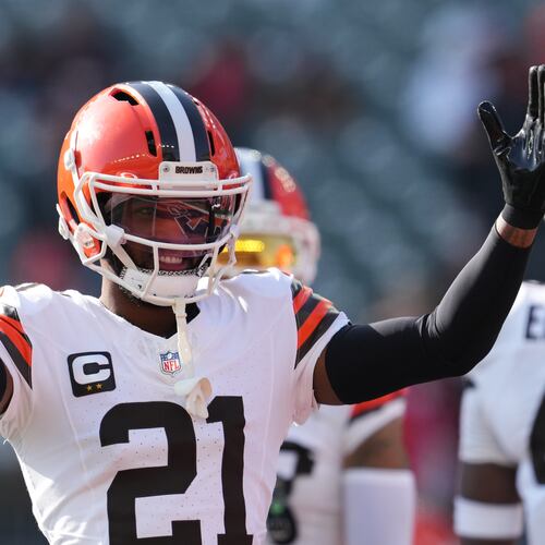 FILE - Cleveland Browns cornerback Denzel Ward warms up before an NFL football game against the Cincinnati Bengals, Jan. 4, 2026, in Cincinnati. (AP Photo/Jeff Dean, File)
