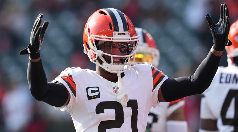 FILE - Cleveland Browns cornerback Denzel Ward warms up before an NFL football game against the Cincinnati Bengals, Jan. 4, 2026, in Cincinnati. (AP Photo/Jeff Dean, File)