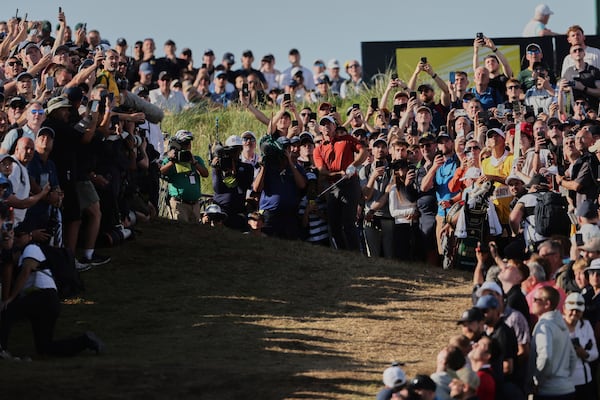 Rory McIlroy of Northern Ireland plays from the rough on the 17th hole during the third round of the British Open golf championship at the Royal Portrush Golf Club, Northern Ireland, Saturday, July 19, 2025. (AP Photo/Peter Morrison)