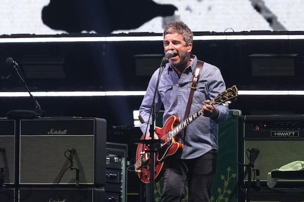 Noel Gallagher from the band Oasis performs during their reunion concert on Friday, July 4, 2025, in Cardiff. (Photo by Scott A Garfitt/Invision/AP)