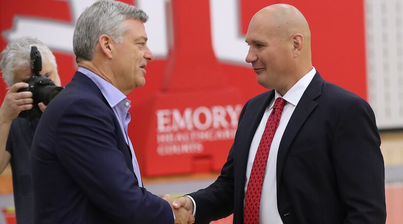 The Atlanta Hawks owner Tony Ressler and general manager Travis Schlenk after a press confernce introducing Lloyd Pierce as the 13th full-time coach in the Atlanta history of the NBA basketball franchise on Monday, May 14, 2018, in Atlanta.    Curtis Compton/ccompton@ajc.com