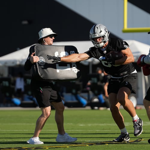 Las Vegas Raiders tight end Brock Bowers (89) runs through a drill during practice at the team's NFL football training camp, Wednesday, July 29, 2026, in Henderson, Nev. (AP Photo/Lucas Peltier)