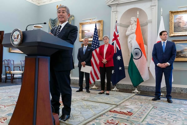 Japanese Foreign Minister Iwaya Takeshi flanked by from left Indian External Affairs Minister Subrahmanyam Jaishankar, Australian Foreign Minister Penny Wong and Secretary of State Marco Rubio speaks to the media before the Indo-Pacific Quad meeting at the State Department in Washington, Tuesday, July 1, 2025. (AP Photo/Jose Luis Magana)