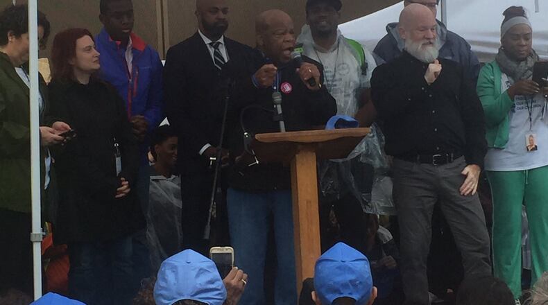 U.S. Rep. John Lewis speaks to a crowd of thousands at an Atlanta rally on Saturday. Photo Michelle Baruchman/ AJC