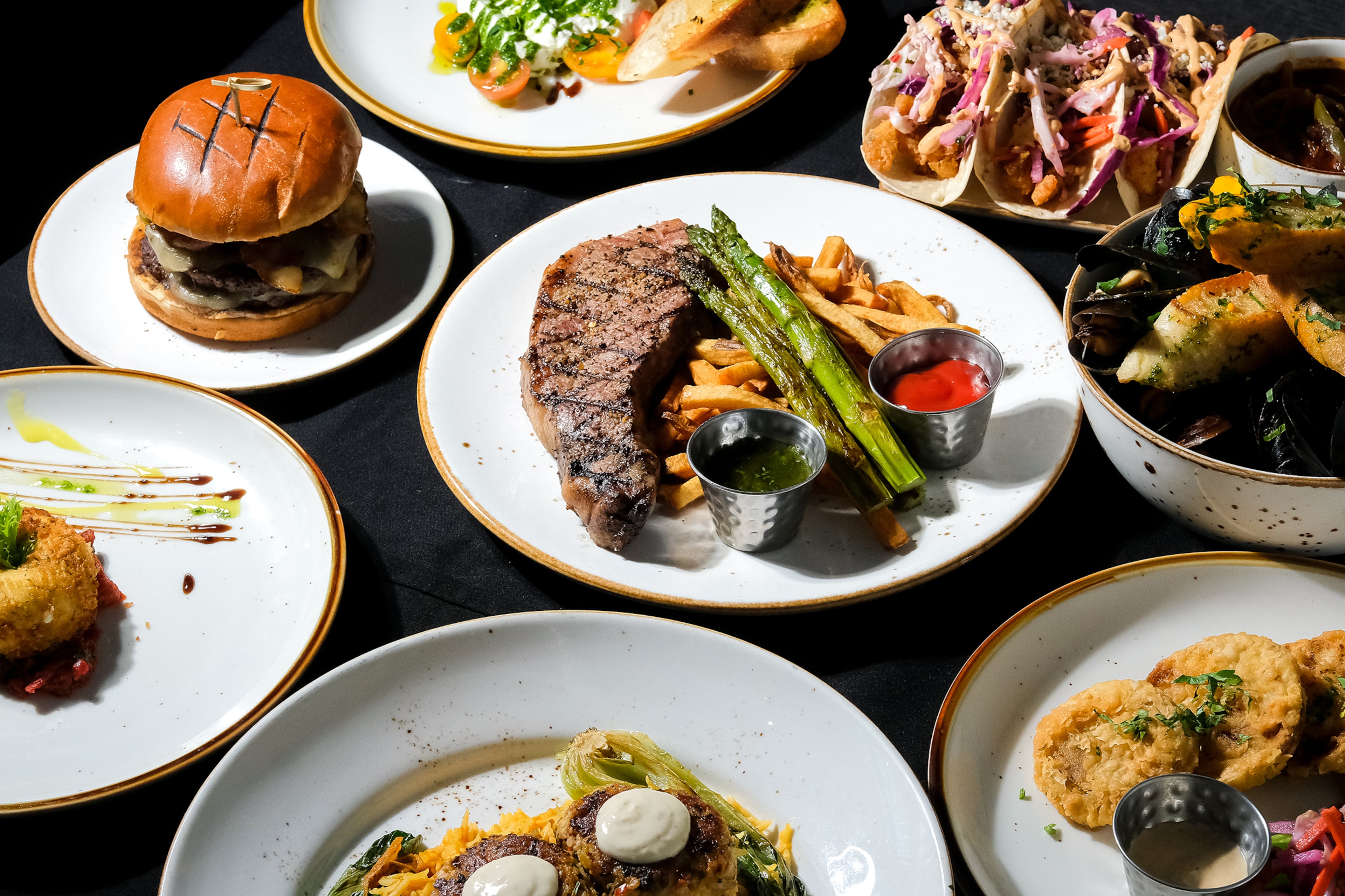 The Local Tavern has opened in the Briar Vista Shopping Center with an American and Italian menu. (Courtesy of the Local Tavern)