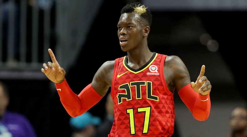 Dennis Schroder #17 of the Atlanta Hawks reacts against the Charlotte Hornets during their game at Spectrum Center on January 26, 2018 in Charlotte, North Carolina.