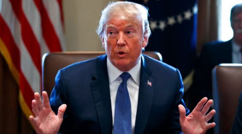 President Donald Trump speaks during a cabinet meeting at the White House, Monday, April 9, 2018. (AP Photo/Evan Vucci)