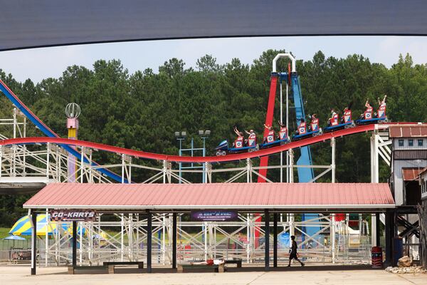 Visitors ride ArieForce One roller coaster at Fun Spot in Fayetteville south of Atlanta on Thursday. The ride boasts the longest zero-gravity stall in the country. (Arvin Temkar/AJC)