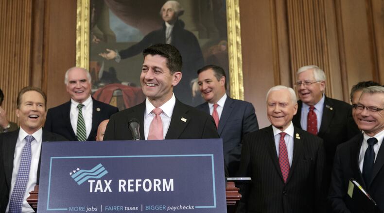 House Speaker Paul Ryan, R-Wis., talks about Republicans' proposed rewrite of the tax code at the Capitol on Sept. 27. The text of a tax bill is to be released Thursday.